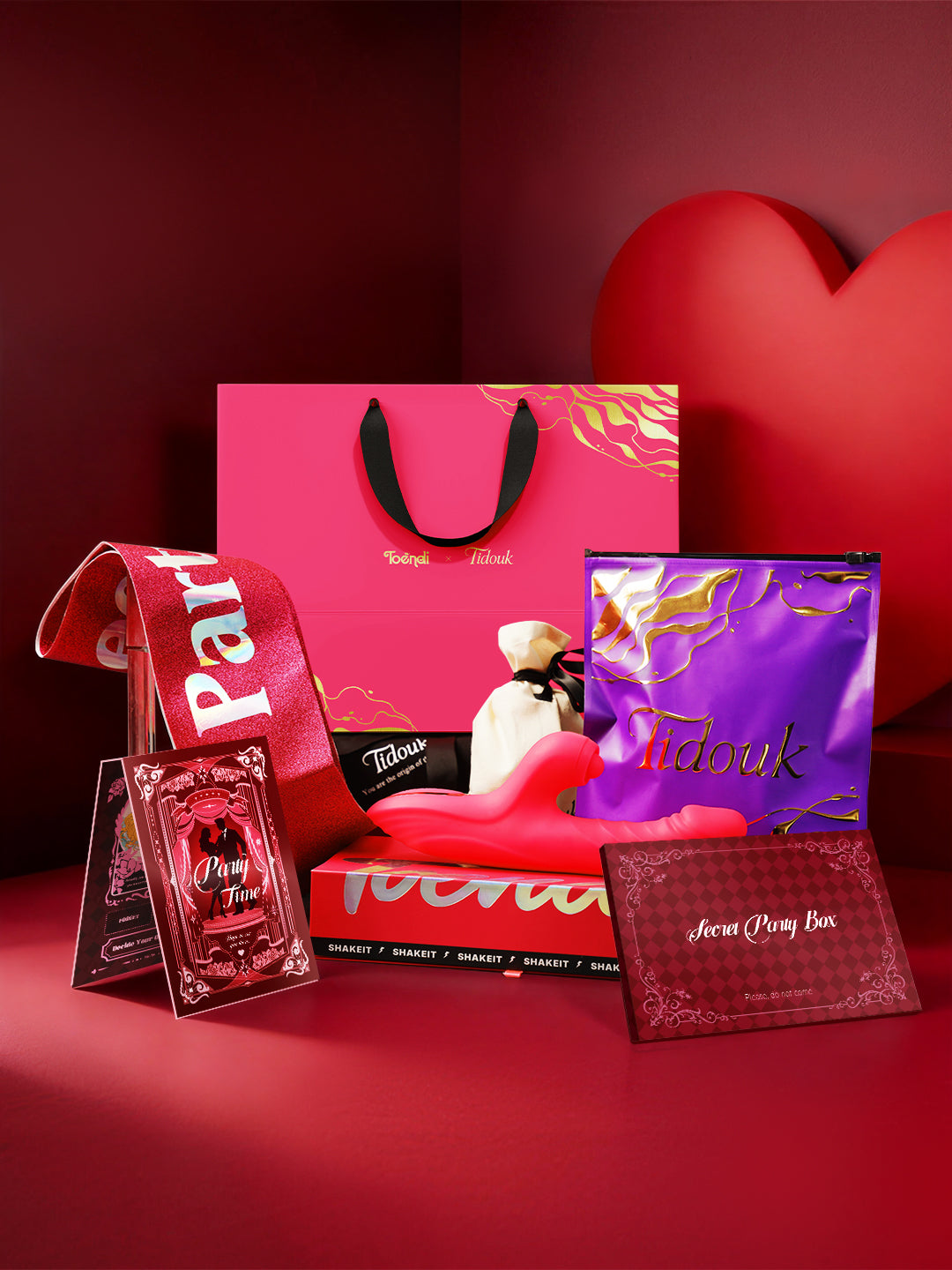 Collection of Tidouk products including a pink box, card, and packaging on a red background