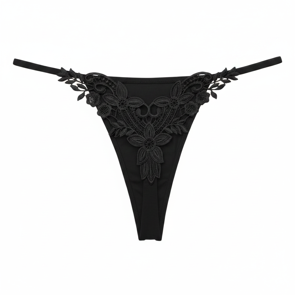 Black floral lace embroidery thong with leaf appliqué detail on white background