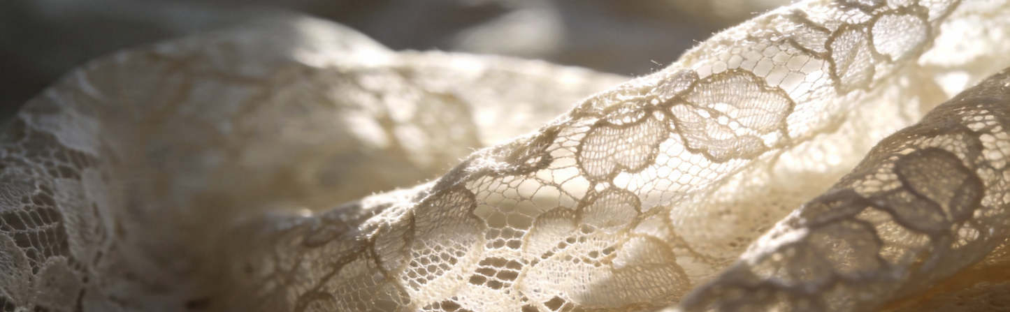 Close-up of delicate lace fabric with a soft focus background